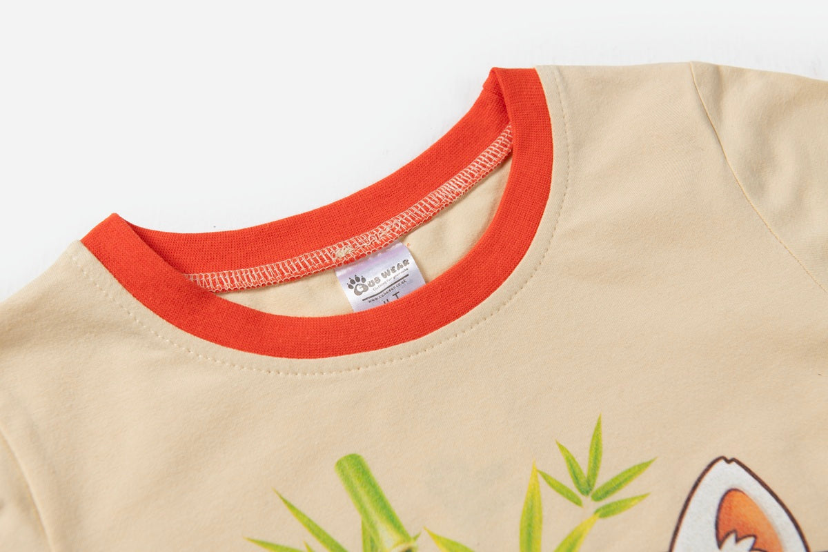 Close-up of Red Panda pyjama sleeve cuff showing soft cotton fabric and quality stitching