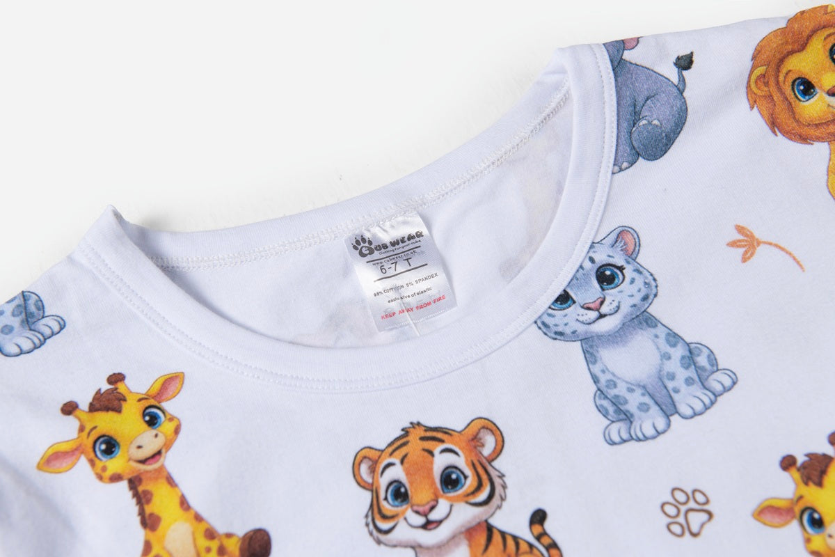 Detailed close-up of the premium animal pyjama fabric showing soft cotton and colourful animal illustrations.
