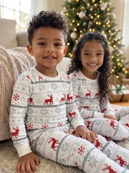 Kids snuggling in their Nordic Christmas PJs