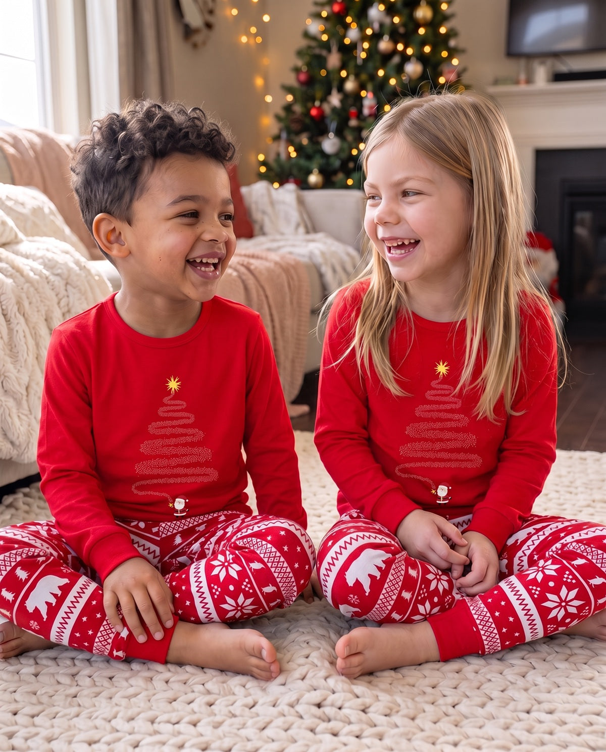 Kids wearing their matching Christmas Pyjamas as Christmas time